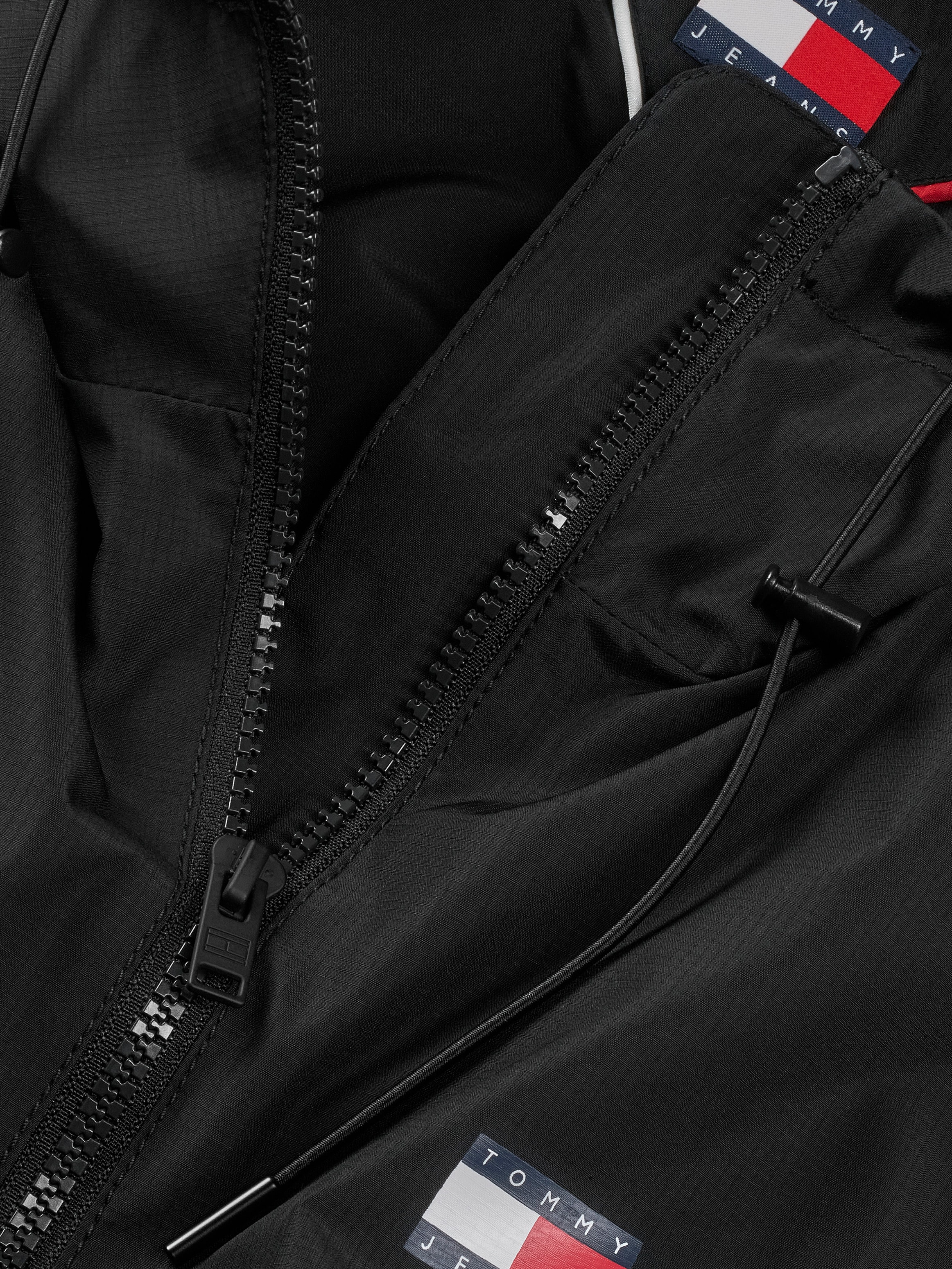 Tommy Jeans Windbreaker »TJW ESSENTIAL WINDBREAKER EXT«, mit Kapuze, mit Logodruck